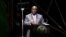 FILE: South African President Ramaphosa, here shown addressing the African Mining Indaba 2023 conference in Cape Town on February 7, is expected Monday to announce new cabinet ministers.