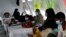 FILE - Rohingya refugees, who suffer from diphtheria, are treated at a Medecins Sans Frontieres (MSF) clinic near Cox's Bazar, Bangladesh, Dec. 18, 2017.