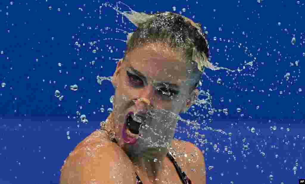 Anna-Maria Alexandri and Eirini Alexandri of Austria compete in the Duet Free Routine Preliminary at the Tokyo Aquatics Centre at the 2020 Summer Olympics in Tokyo, Japan.