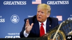 President Donald Trump speaks during a roundtable discussion with commercial fishermen at Bangor International Airport in Bangor, Maine, June 5, 2020.