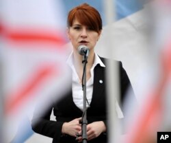 FILE - Maria Butina speaks at a rally in support of legalizing the possession of handguns, in Moscow, Russia, April 21, 2013.