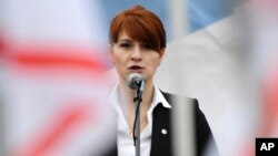 FILE - Maria Butina speaks at a rally in support of legalizing the possession of handguns, in Moscow, Russia, April 21, 2013. 