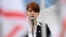 FILE - Maria Butina speaks at a rally in support of legalizing the possession of handguns, in Moscow, Russia, April 21, 2013. 