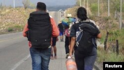 Warga dari negara-negara Amerika tengah tiba di Ixtepec, Oaxaca, Meksiko sebelum mencoba memasuki perbatasan Amerika. 