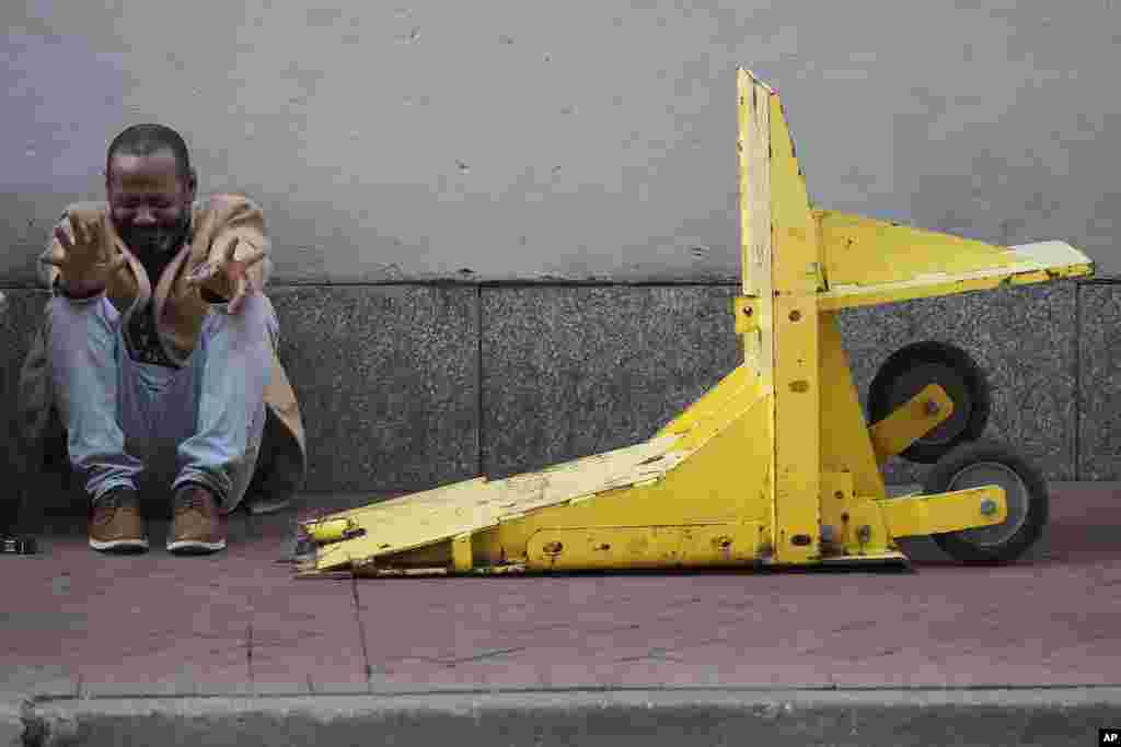 Jovon Bell from New York, who said he was injured in the New Year's attack, reacts near a temporary barrier set up in the French Quarter, in New Orleans, Jan. 2, 2025.