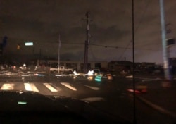 Debris scattered across an intersection, March 3, 2020, in downtown Nashville, Tenn.