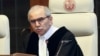 FILE - Judge Nawaf Salam, president of the International Court of Justice, speaks at the ICJ at the start of a hearing in The Hague, Netherlands, May 16, 2024. 