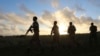 FILE - Somali army soldiers are seen near Barawe, Somalia, Oct. 4, 2014. Somalian soldiers might soon join peacekeeping forces in South Sudan.