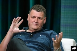 FILE - Lead writer and executive producer Steven Moffat appears during the "Doctor Who" panel at the BBC America 2015 Summer TCA Tour at the Beverly Hilton Hotel, Friday, July 31, 2015, in Beverly Hills, Calif.