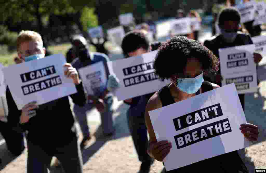 People protest against the death of George Floyd who died in police custody in Minneapolis, next to the U.S. embassy in Paris, France, June 1, 2020.