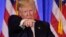 President Donald Trump, taking questions at his news conference in New York on Jan. 11, 2017, says reports that Russian agents collected damaging information about him were "all fake news.