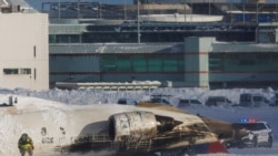 達美客機在多倫多皮爾遜機場著陸時翻倒19人受傷