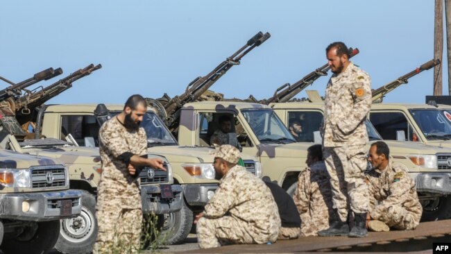 Forces loyal to Libya's U.N.-backed unity government arrive in Tajura, a coastal suburb of the Libyan capital, Tripoli, April 6, 2019, from their base in Misrata. 