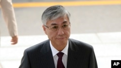 中国驻韩国大使邱国红抵达韩国外交部，韩方召见中国大使，提出抗议（2016年10月11日）