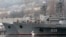 Russian military vessels are anchored at a navy base in the Ukrainian Black Sea port of Sevastopol in Crimea, Feb. 27, 2014.