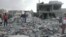 Months after an airstrike on a neighborhood populated by black Yemenis - or "Muhamasheen" - more than a hundred buildings still remain in rubble and survivors continue to search for any valuables, in Sana'a, Yemen, Oct. 9, 2015. (VOA/A. Mojalli)