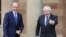 Britain's Prime Minister Boris Johnson and Ireland's Prime Minister (Taoiseach) Micheal Martin are seen at Hillsborough Castle, in Belfast, Northern Ireland, Aug. 13, 2020. 