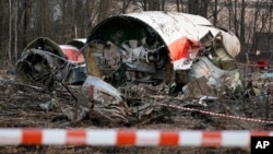 FILE - An April 11, 2010 photo shows the wreckage of the Polish presidential plane which crashed in Smolensk, western Russia. Polish President Lech Kaczynski, his wife and 96 prominent Poles died in the crash.