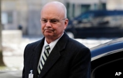 FILE - Former CIA Director Michael Hayden arrives at the Munich Security Conference, Feb. 3, 2012.