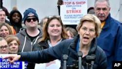 FILE - Presidential hopeful Sen. Elizabeth Warren, D-Mass., speaks after she joined striking Stop & Shop supermarket employees on the picket line, April 12, 2019, in Somerville, Mass.