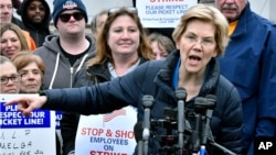 Democratic Presidential hopeful, Sen. Elizabeth Warren, D-Mass., speaks after she joined striking Stop & Shop supermarket employees on the picket line, April 12, 2019, in Somerville, Mass.