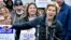 Democratic Presidential hopeful, Sen. Elizabeth Warren, D-Mass., speaks after she joined striking Stop & Shop supermarket employees on the picket line, April 12, 2019, in Somerville, Mass.