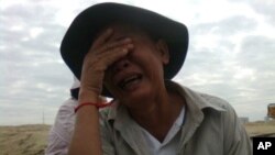 អ្នកភូមិបឹងកក់ម្នាក់នេះ យំស្រែកតវ៉ាក្នុងរឿង​​ទំនាស់​ដីធ្លី​​​​ជាមួយនឹង​ក្រុមហ៊ុន​ស៊ូកាគូអ៊ីន។​