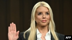 FILE - Former Florida Attorney General Pam Bondi is sworn in during a Senate Judiciary Committee hearing on her nomination to be U.S .Attorney General, on Capitol Hill, in Washington, on Jan. 15, 2025.