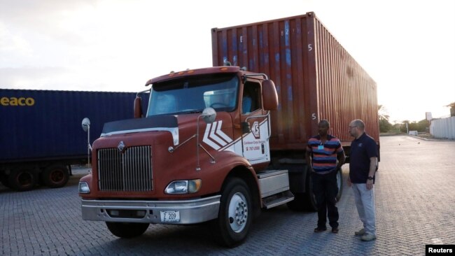 A truck carrying humanitarian aid arrives at the port in Willemstad on the island of Curacao, Feb. 23, 2019.