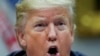 FILE PHOTO: U.S. President Donald Trump speaks to reporters during roundtable on small business at the White House in Washington