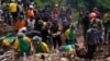 Rescuers search for victims of an earthquake-triggered landslide in Cianjur, West Java, Indonesia, Nov. 23, 2022.