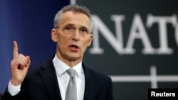 NATO Secretary-General Jens Stoltenberg addresses a news conference during a NATO defence ministers meeting at the Alliance headquarters in Brussels, Belgium, Feb. 15, 2018. 