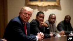 President Donald Trump speaks during a round-table discussion with African American supporters in the Cabinet Room of the White House, June 10, 2020, in Washington.