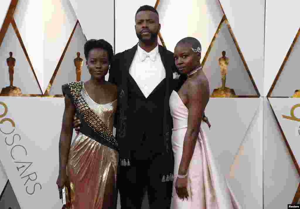 Lupita Nyong'o, Winston Duke and Danai Gurira (L to R) arrive at the 90th Academy Awards in Hollywood, Ca., March 4, 2018.