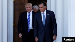 President-elect Donald Trump (L) and former Massachusetts Governor Mitt Romney emerge after their meeting at the clubhouse at Trump National Golf Club in Bedminster, New Jersey, Nov. 19, 2016. A fierce Trump critic during the campaign, Romney is among those being considered for secretary of state.