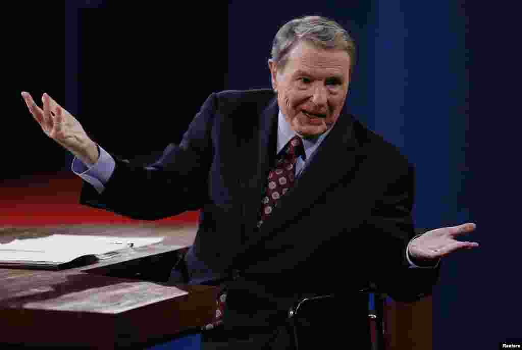 Moderator Jim Lehrer speaks to the audience at the start of the first presidential debate between President Barack Obama and Republican presidential nominee Mitt Romney in Denver.