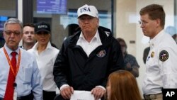 President Donald Trump and first lady Melania Trump participate in a tour of the Texas Department of Public Safety Emergency Operations Center, Aug. 29, 2017, in Austin, Texas.