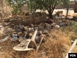 FILE - Explosives were left behind by IS militants after Peshmerga fighters retook villages in a recent offensive toward the IS stronghold of Mosul, June 6, 2016. (S. Behn/VOA)