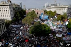 Protesters gather at Plaza de Mayo during a demonstration in Buenos Aires, Argentina, March 30, 2017.