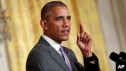 FILE - President Barack Obama speaks in the East Room of the White House in Washington. 