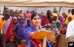 FILE - Malala Yousafza, speaks to refugees in the Dadaab refugee camp, Kenya, July 12, 2016.