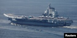 FILE - China's aircraft carrier Liaoning departs Hong Kong, China, July 11, 2017. REUTERS/Bobby Yip/File Photo