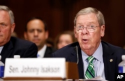 FILE - Sen. Johnny Isakson, R-Ga., pictured at a Senate Judiciary Committee hearing on Capitol Hill in September 2017, is chairman of the Senate Ethics Committee.