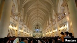 Catholics attend an ordination ceremony at the Citeaux Chau Son abbey in Vietnam's Ninh Binh province