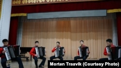 North Korean students at Pyongyang's Kum song Music School perform for Norwegian television cameras. March 12, 2013