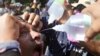 Polisi Thailand Gunakan Gas Air Mata dan Meriam Air Untuk Mengusir Demonstran