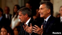 Argentina's President Mauricio Macri gestures as he speaks during the opening session of the 134th legislative term at the Congress in Buenos Aires, Argentina, March 1, 2016. 
