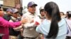 Yang Sophoan, president of the Cambodian Alliance of Trade Unions, clashes with the security police​ during a protest by over 100 members of labor unions in front of National Assembly, Monday April 4th 2016. (Leng Len/ VOA Khmer)