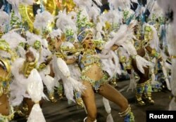 Revellers from Uniao da Ilha samba school perform during the second night of the carnival parade at the Sambadrome in Rio de Janeiro, Brazil, Feb. 27, 2017.