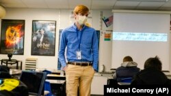 Cooper Hanson, a student at Hanover College, is one of several college students being recruited to work as substitute teachers in schools during the pandemic. Thursday, Dec. 10, 2020.